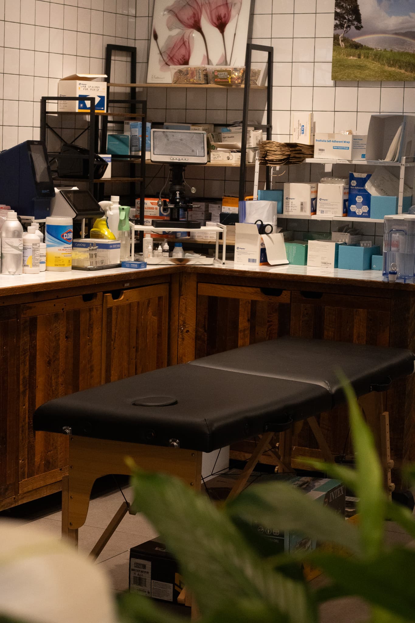 Aloha Urgent Care treatment room with examination table and medical supplies
