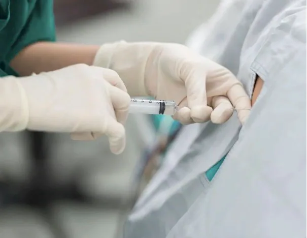 Lumbar spine cortisone injection for pain relief