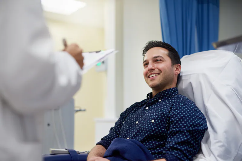 Doctor speaking with a patient during an urgent care visit